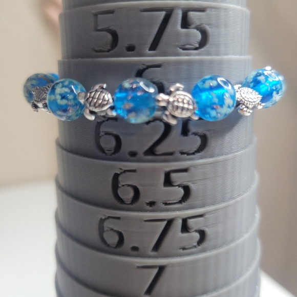 NWT Turtle Charms W Ocean Blue Glow In The Dark Firefly Glass Stretch Bracelet - Picture 3 of 14